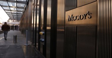 Signage is seen outside the Moody&#039;s Corporation headquarters in Manhattan, New York, U.S., Nov. 12, 2021. (Reuters Photo)