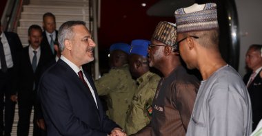 Local officials welcome Foreign Minister Hakan Fidan (L) at the airport, Niamey, Niger, July 17, 2024. (AA Photo)