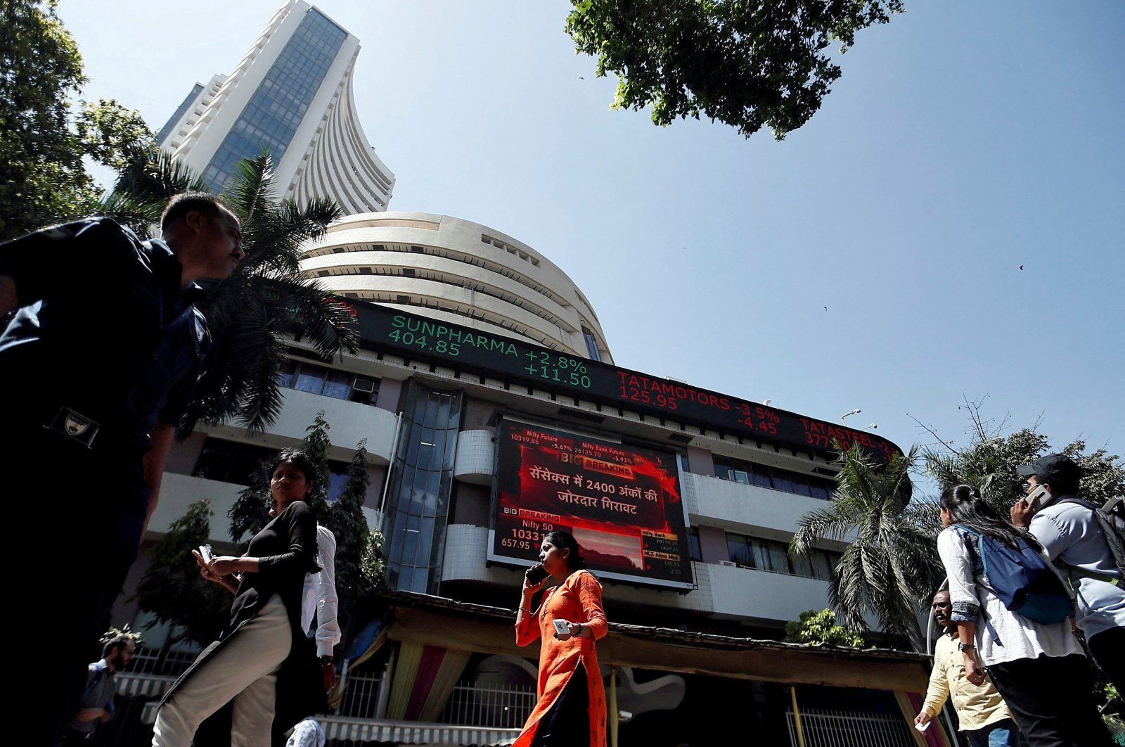 People walk past the Bombay Stock Exchange (BSE) building in Mumbai, India, March 9, 2020. (Reuters Photo)