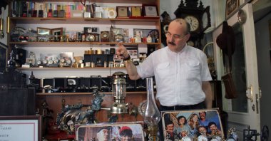 Murat Akyazıcı, 53, shows his collection at his bridal shop in the Grand Bazaar, Giresun, northern Türkiye, July 21, 2024. (IHA Photo)