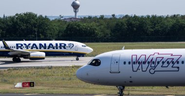 Ryanair and a Wizz Air aircraft are seen on the runway at Ferenc Liszt International Airport in Budapest, Hungary, July 9, 2024. (Reuters Photo)