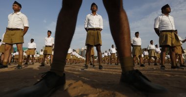 Members of the Hindu nationalist Rashtriya Swayamsevak Sangh (RSS) stand during the Hindu New Year festival in Ahmedabad, India, April 10, 2016. (AP Photo)