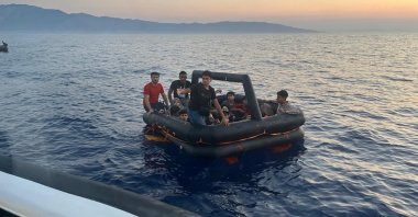 The Turkish coast guard intercepts a life raft carrying migrants pushed back by Greece, off the coast of western Muğla province, Türkiye, July 21, 2024. (AA Photo)