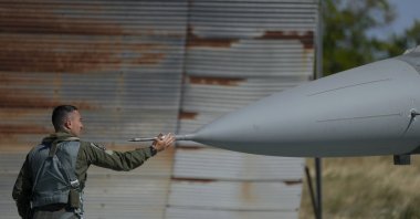 The pilot of the Greek Fighter Jet F-16 Viper checks the aircraft before takeoff at Tanagra Air Force Base, near Athens, Greece, Sept. 12, 2022. (AP Photo)