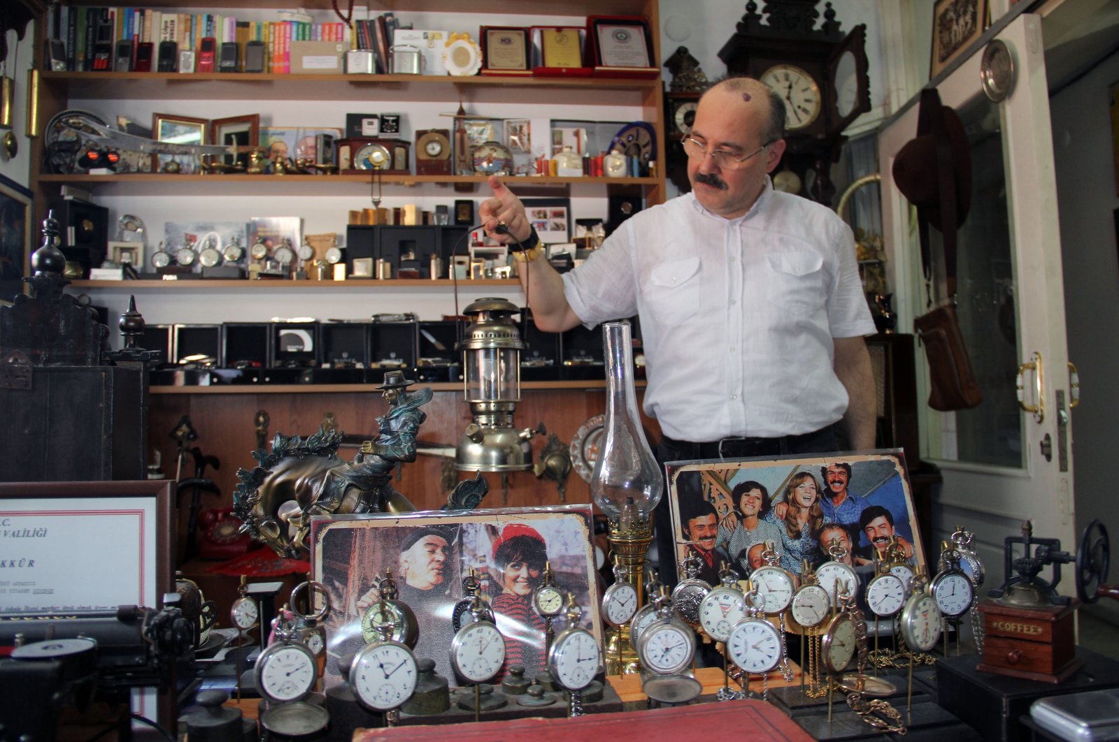 Murat Akyazıcı, 53, shows his collection at his bridal shop in the Grand Bazaar, Giresun, northern Türkiye, July 21, 2024. (IHA Photo)