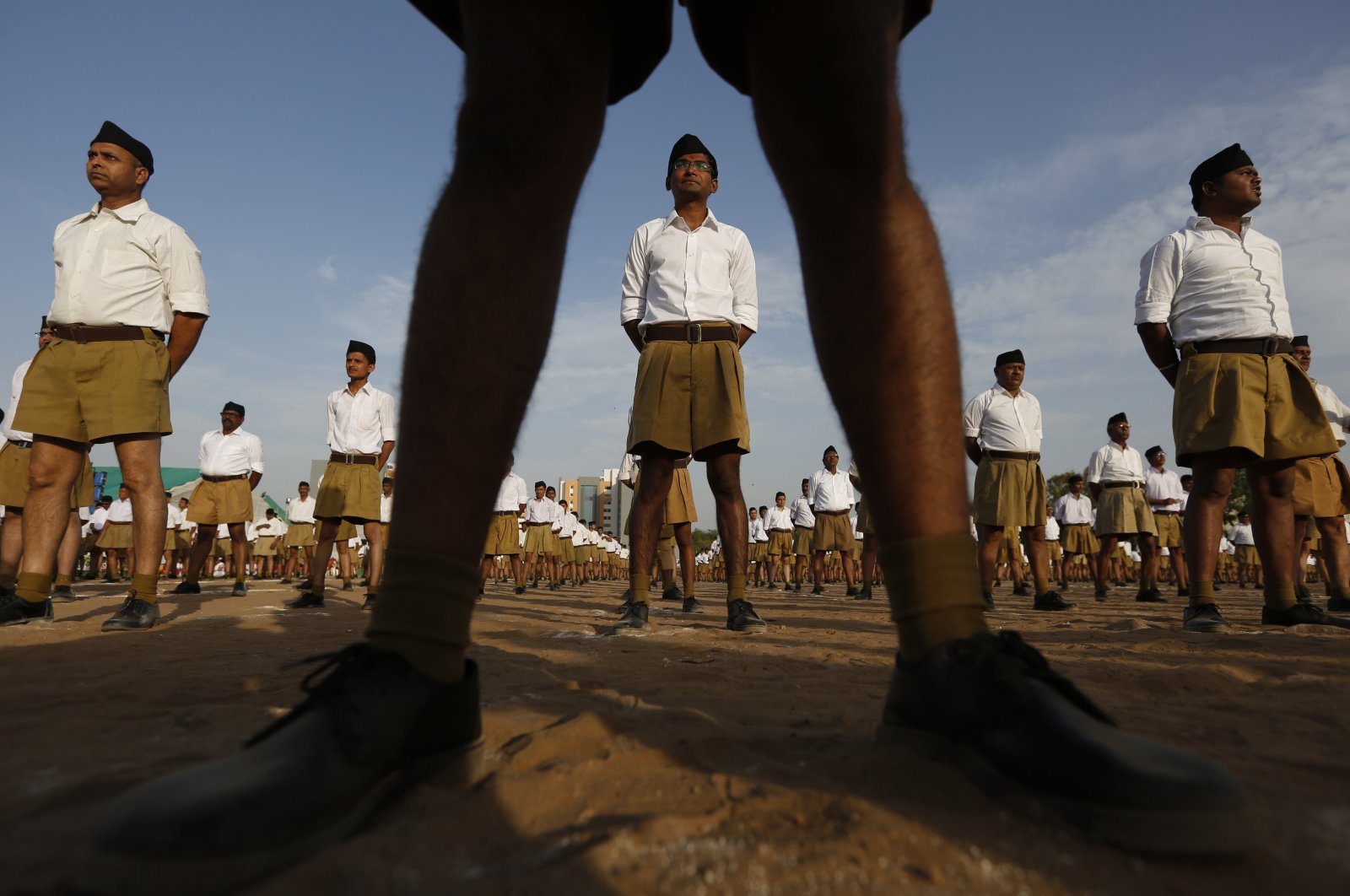 Members of the Hindu nationalist Rashtriya Swayamsevak Sangh (RSS) stand during the Hindu New Year festival in Ahmedabad, India, April 10, 2016. (AP Photo)