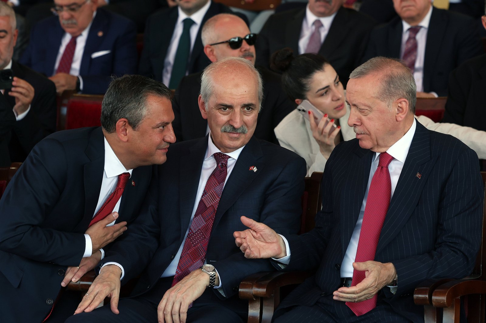 President Recep Tayyip Erdoğan (R) converses with Republican People’s Party (CHP) leader Özgür Özel (L) and Parliament Speaker Numan Kurtulmuş during an event in Lefkoşa (Nicosia), TRNC, July 20, 2024. (AA Photo)