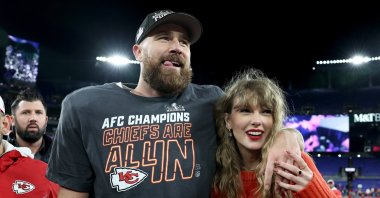 Kansas City Chiefs' Travis Kelce (L) celebrates with Taylor Swift after a 17-10 victory against the Baltimore Ravens in the AFC Championship Game at M&T Bank Stadium, Baltimore, Maryland, U.S., Jan. 28, 2024. (Getty Images Photo)