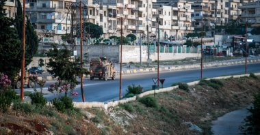 Turkish military patrol on the M4 highway in the outskirts of Idlib, northwestern Syria, June 25, 2023 (Reuters Photo)