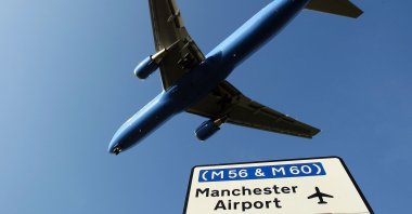 A passenger aircraft landing at Manchester International Airport approaches the runway on Jan. 28, 2008, Manchester, England. (Getty Images)