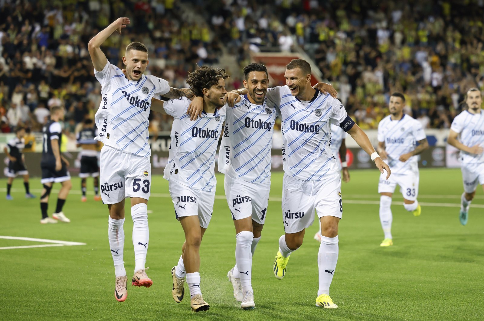 Fenerbahçe players celebrate a goal in a UEFA Champions League qualifying second round first leg soccer match against FC Lugano in Thun, Switzerland, July 23, 2024. (EPA Photo)