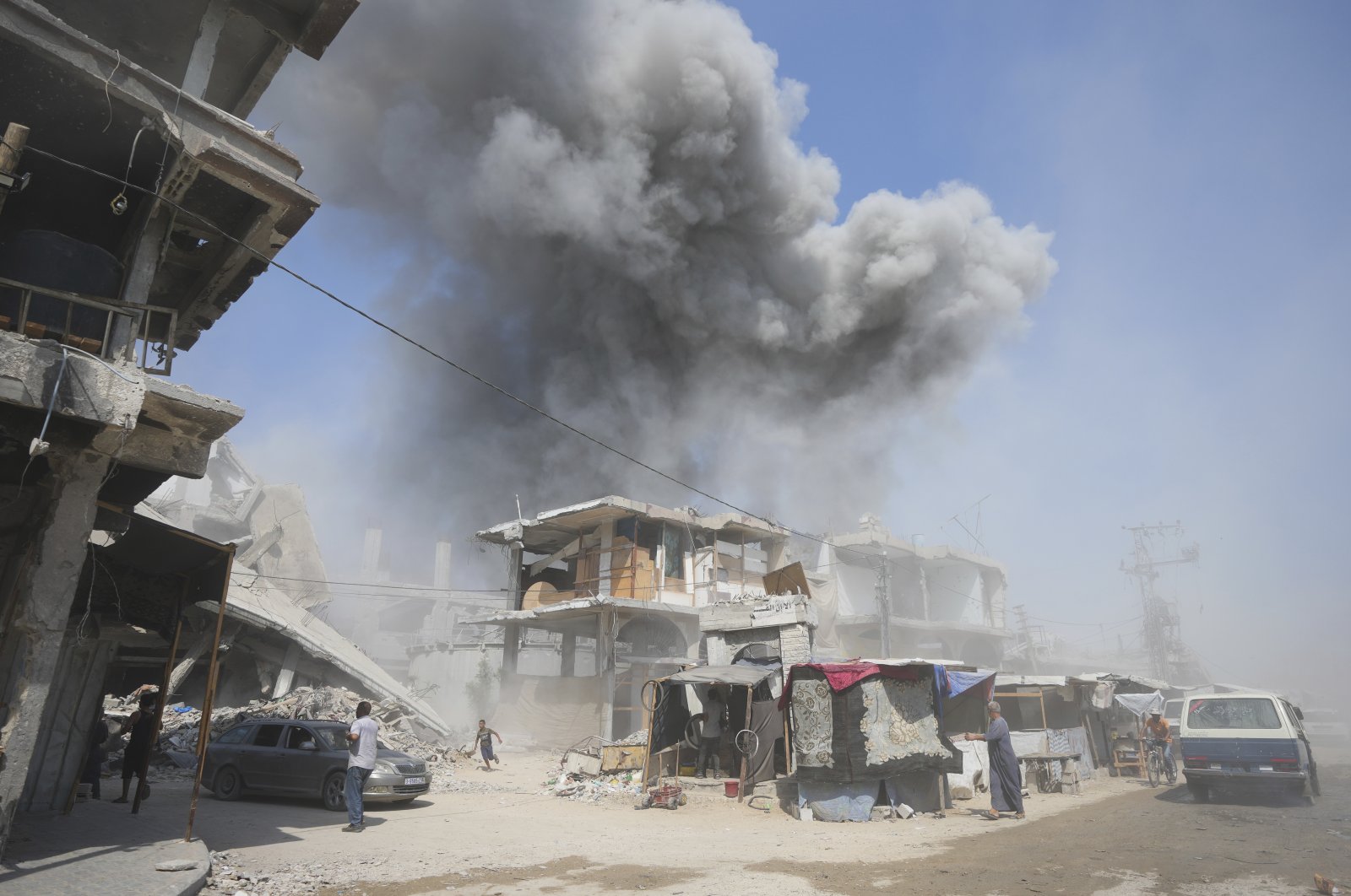 Smoke rises following Israeli bombardments in Khan Younis, Gaza Strip, Monday, July 22, 2024. (AP Photo/Abdel Kareem Hana)