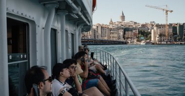 People ride a ferry, Istanbul, Turkiye, June 9, 2024. (Reuters Photo)
