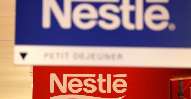 Nestle logos are pictured in the supermarket of Nestle headquarters, Vevey, Switzerland, Feb. 13, 2020. (Reuters Photo)