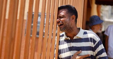 A mourner reacts during the funeral of Palestinians killed in Israeli strikes, amid the Israel-Hamas conflict, at Al-Nasser Hospital, in Khan Younis, southern Gaza Strip, Palestine, July 22, 2024. (Reuters Photo)