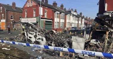 A burnt out car in the Leeds suburb of Harehills, Leeds, Britain, July 19, 2024. (AP Photos)