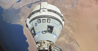 This photo provided by NASA shows the Starliner spacecraft docked to the Harmony module of the International Space Station, orbiting 262 miles above Egypt's Mediterranean coast, June 13, 2024. (NASA via AP)