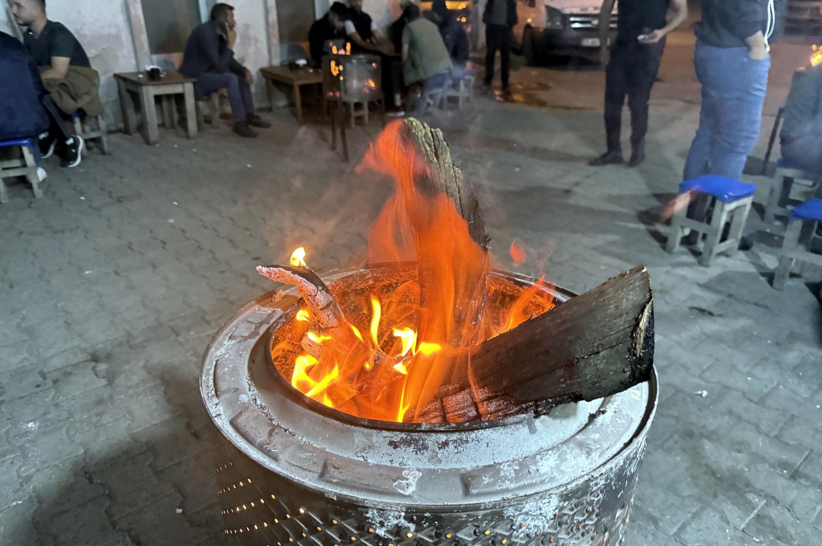 Fires are lit in the streets for people who go out at night, Göle, Türkiye, July 24, 2024. (AA Photo)