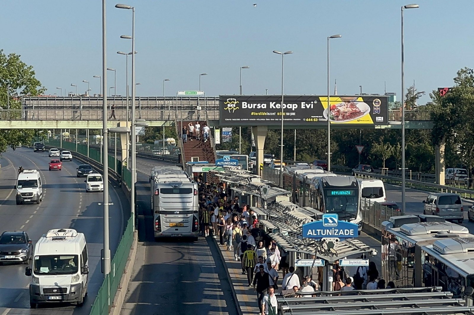 People wait at the Altunizade Metrobus station on the Anatolian side of Istanbul, Türkiye, July 18, 2024. (AA Photo)