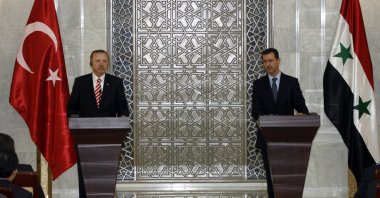 Then Prime Minister Recep Tayyip Erdoğan and Syrian President Bashar Assad speak to reporters during a press conference, Dec. 23, 2009. (AP Photo)
