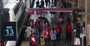 Staff and passengers are pictured at Gare du Nord station after breakdowns of France's high-speed TGV network, ahead of the Paris 2024 Olympics opening ceremony, Paris, France, July 26, 2024. (Reuters Photo)