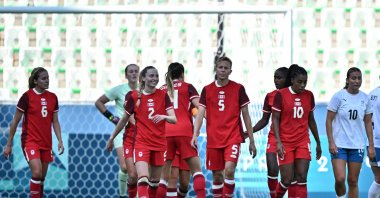 Canada&#039;s forward #06 Cloe Lacasse celebrates with teammates after scoring her team&#039;s first goal in the women&#039;s group A football match between Canada and New Zealand during the Paris 2024 Olympic Games at the Geoffroy-Guichard Stadium in Saint-Etienne on July 25, 2024. (AFP Photo)