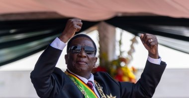 Zimbabwe&#039;s President Emmerson Mnangagwa dances as he celebrates after being inaugurated at the National Sports Stadium, Harare, Zimbabwe, Sept. 4, 2023. (Getty Images Photo)