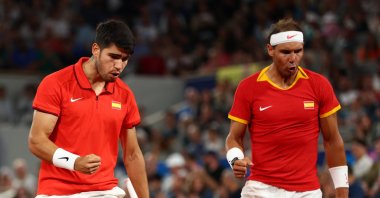 Rafael Nadal (R) and Carlos Alcaraz of Spain react during their Men's Doubles first round match against Maximo Gonzalez and Andres Molteni of Argentina at the Paris 2024 Olympic Games, Roland Garros, Paris, France, July 27, 2024. (EPA Photo)
