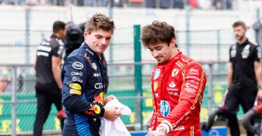 Red Bull Racing&#039;s Dutch driver Max Verstappen (L) and Ferrari&#039;s Monegasque driver Charles Leclerc react after the qualifying session ahead of the Formula One Belgian Grand Prix at the Spa-Francorchamps Circuit, Spa, Belgium, July 27, 2024. (AFP Photo)