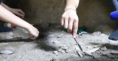 Archaeologists work in the excavations in Direkli Cave, Kahramanmaraş, Türkiye, July 22, 2024. (AA Photo)