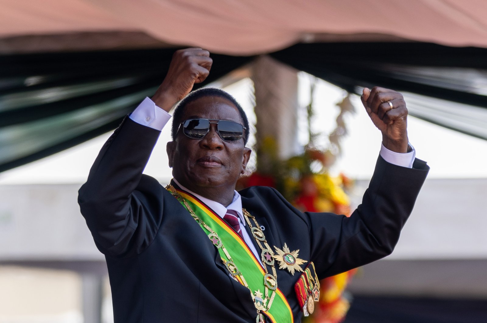 Zimbabwe&#039;s President Emmerson Mnangagwa dances as he celebrates after being inaugurated at the National Sports Stadium, Harare, Zimbabwe, Sept. 4, 2023. (Getty Images Photo)