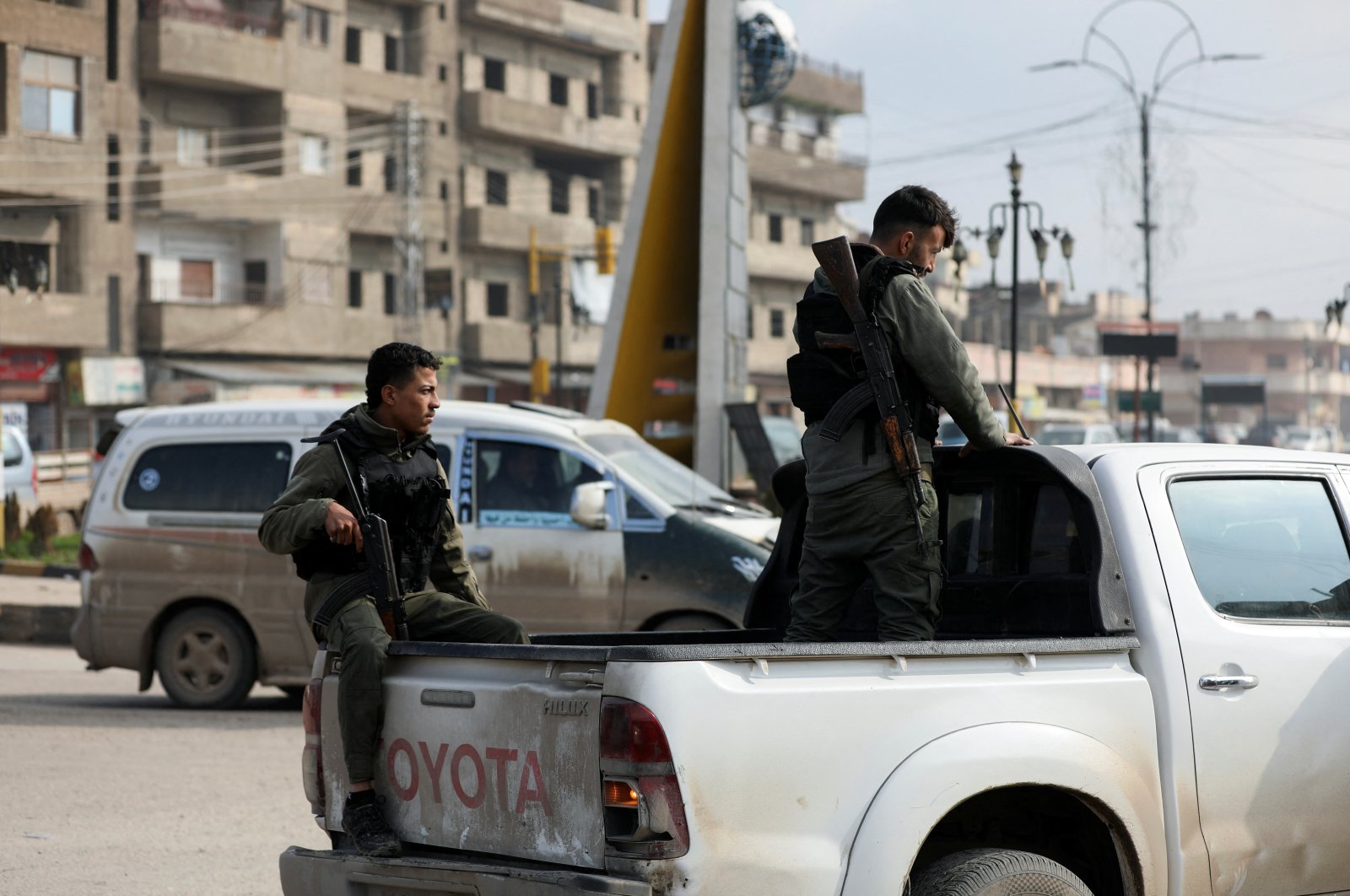 Members of the PKK/YPG terrorist group are seen on a street in Qamishli, northern Syria, Feb. 7, 2024. (Reuters Photo)