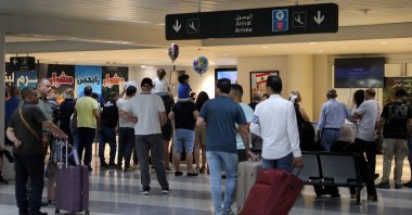 People stand at the Beirut-Rafic Hariri International Airport, Beirut, Lebanon, July 28, 2024. (Reuters Photo)