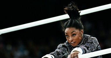 U.S.&#039; Simone Biles competes in the uneven bars event of the artistic gymnastics women&#039;s qualification during the Paris 2024 Olympic Games at the Bercy Arena, Paris, France, July 28, 2024. (AFP Photo)