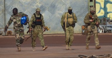 This undated photo shows three Russian mercenaries in northern Mali, (AP Photo)