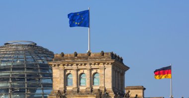 German and EU flags are seen on the Reichstag building in Berlin, in this undated file photo. (Getty Images, File Photo)