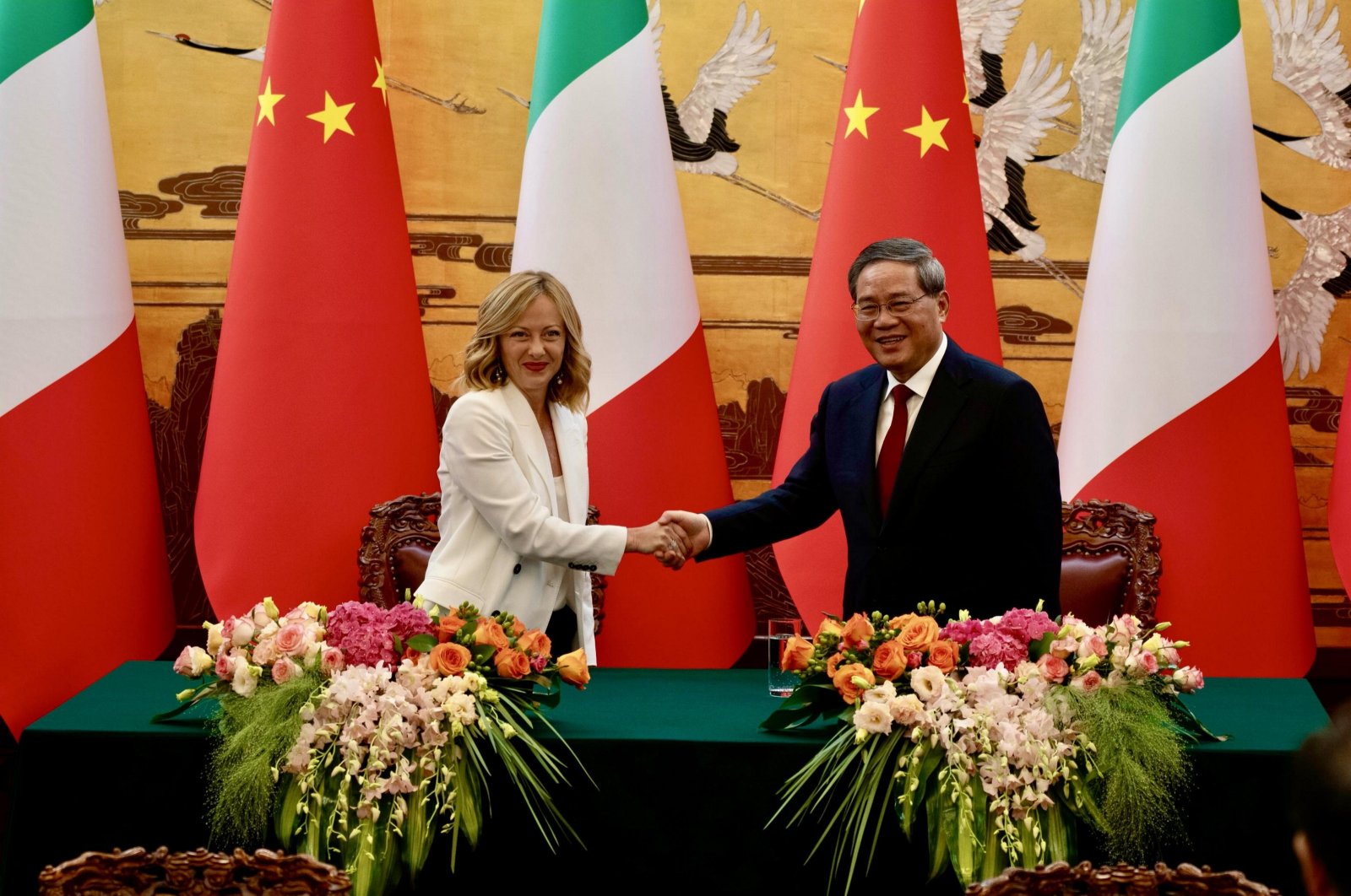 A handout photo made available by Chigi Palace shows Chinese Prime Minister Li Qiang (R) and Italian Prime Minister Giorgia Meloni (L) during their meeting at the Great Hall of the People in Beijing, China, July 28, 2024. (EPA Photo)