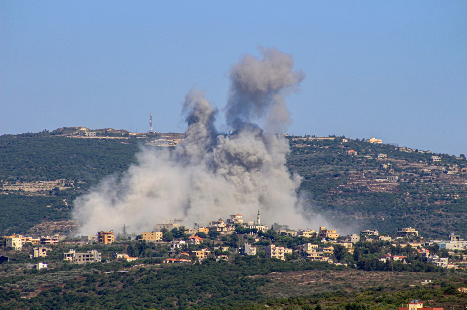 Smoke billows following an Israeli airstrike in the village of Chihine, southern Lebanon, July 28, 2024. (AFP Photo)