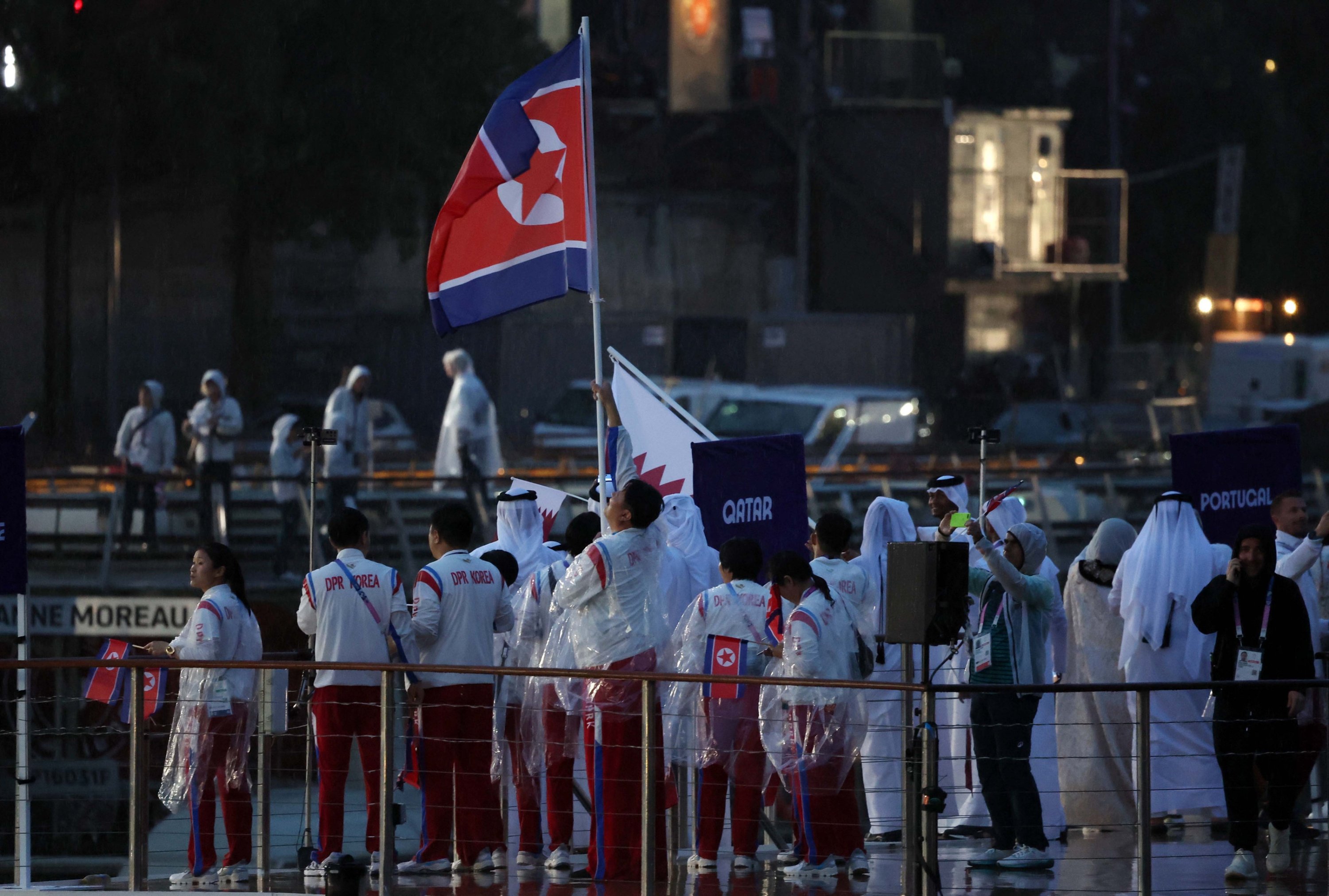 North Korean athletes raise their country's flag during the opening ceremony of the Paris Olympics, Paris, France, July 26, 2024. (EPA Photo)