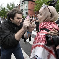 A pro-Israel demonstrator (L) shouts at a pro-Palestinian demonstrator during a pro-Palestinian protest in Washington, U.S., April 27, 2024. (AP Photo)