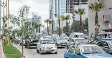 Cars drive past newly planted trees and light installations in Addis Ababa, Ethiopia, July 27, 2024. (AFP Photo)