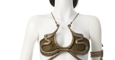 This photo provided by Heritage Auctions shows the gold bikini-style costume that Carrie Fisher wore as Princess Leia while making &quot;Return of the Jedi” in the &quot;Star Wars” franchise, which was sold for $175,000 during an auction July 26, 2024. (AP Photo)