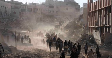 Palestinian civilians make their way as they return to the eastern side of Khan Younis after Israeli forces pulled out from the area, Khan Younis, Gaza Strip, Palestine, July 30, 2024. (Reuters Photo)