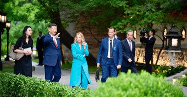 Italian Prime Minister Giorgia Meloni (C) and Chinese President Xi Jinping (2nd L) during their meeting in Beijing, China, July 29, 2024. (Chigi Palace Press Office Handout via EPA Photo)