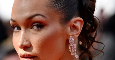 U.S. model Bella Hadid arrives for the screening of the film &quot;L&#039;Amour Ouf&quot; (Beating Hearts) at the 77th edition of the Cannes Film Festival in Cannes, France, May 23, 2024. (AFP Photo)