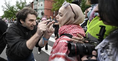 A pro-Israel demonstrator (L) shouts at a pro-Palestinian demonstrator during a pro-Palestinian protest in Washington, U.S., April 27, 2024. (AP Photo)
