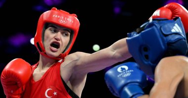 Türkiye&#039;s Esra Yıldız Kahraman (L) fights against Mali&#039;s Marine Camara in the women&#039;s 57 kg. preliminaries round of 32 boxing match during the Paris 2024 Olympic Games at the North Paris Arena, Villepinte, France, July 30, 2024. (AFP Photo)