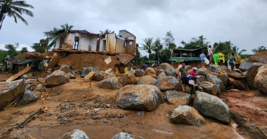 Rescuers and others inspect the spot after landslides hit hilly villages in Wayanad district, Kerala state, India, Tuesday, July 30, 2024. (AP Photo)
