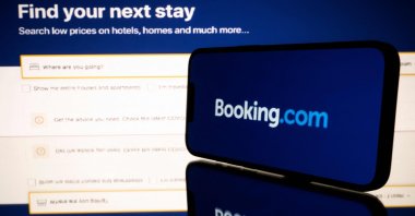 Screens displaying the logo and the website of the online travel and accommodation services platform Booking.com, Toulouse, France, Jan. 25, 2023. (AFP File Photo)
