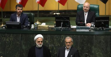 Iranian President-elect Masoud Pezeshkian (Below-Right) is sworn-in as new president, during an inauguration ceremony at the Iranian parliament in Tehran, Iran, July 30, 2024. (EPA Photo)